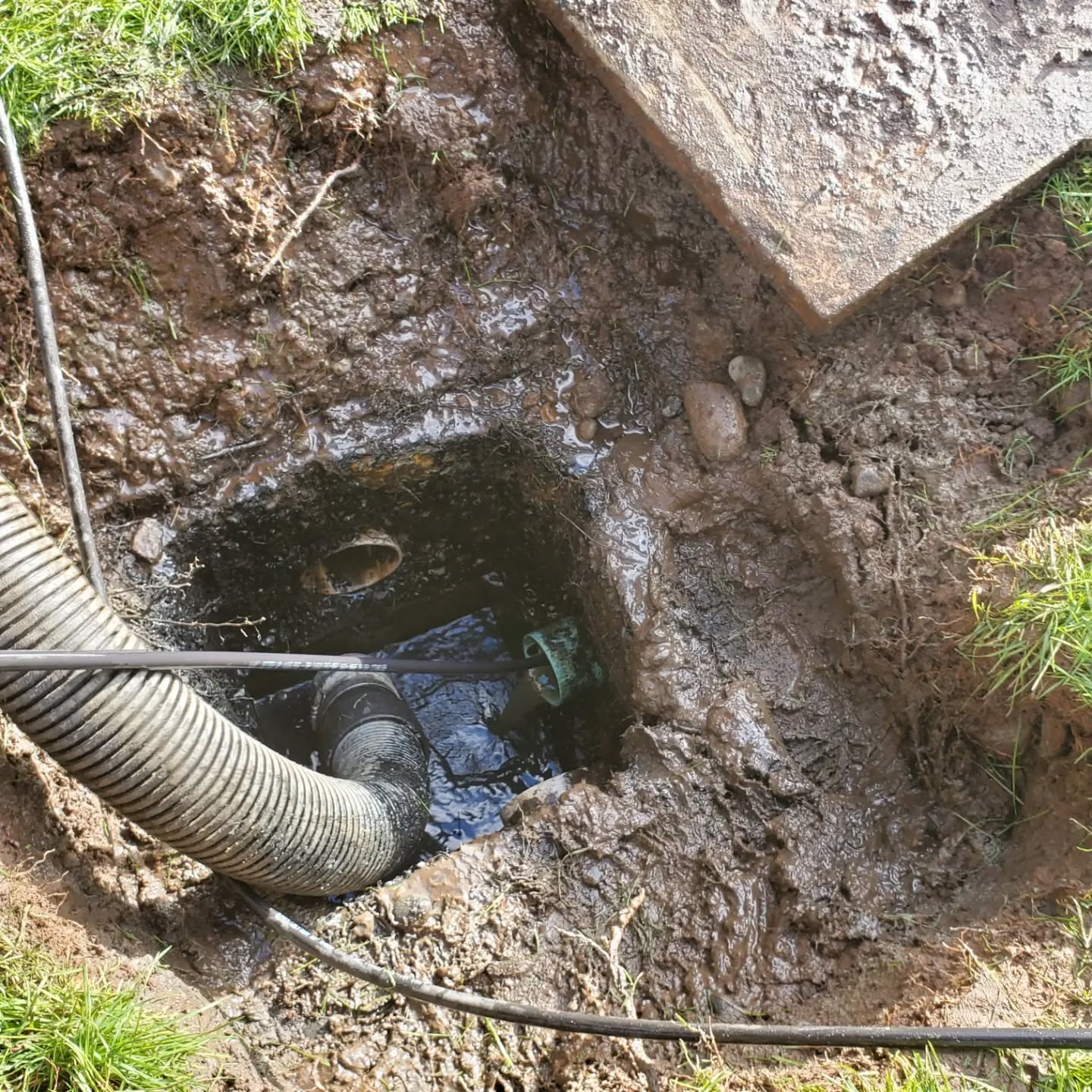 Hoses and service equipment used during wastewater maintenance work.